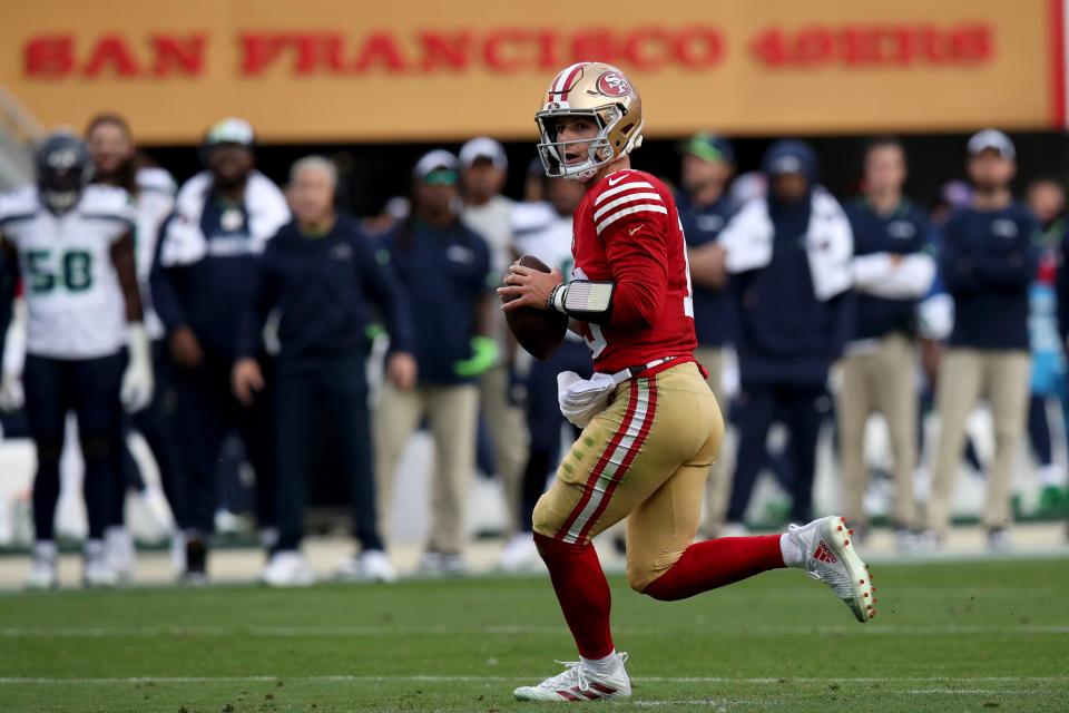 San Francisco 49ers quarterback Brock Purdy (13) throws during an NFL football game against the Seattle Seahawks, Sunday, Dec. 10, 2023, in Santa Clara, Calif. (AP Photo/Scot Tucker)