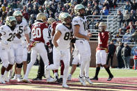 Wake Forest quarterback Sam Hartman (10) celebrates with teammate Blake Whiteheart (85) after scoring a touchdown during the first half of an NCAA college football game against Boston College, Saturday, Nov. 27, 2021, in Boston. (AP Photo/Mary Schwalm)