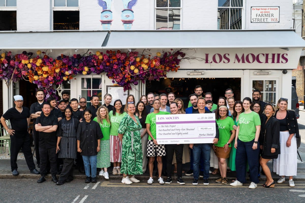 Los Mochis in Notting Hill celebrate a record donation  (Press handout )