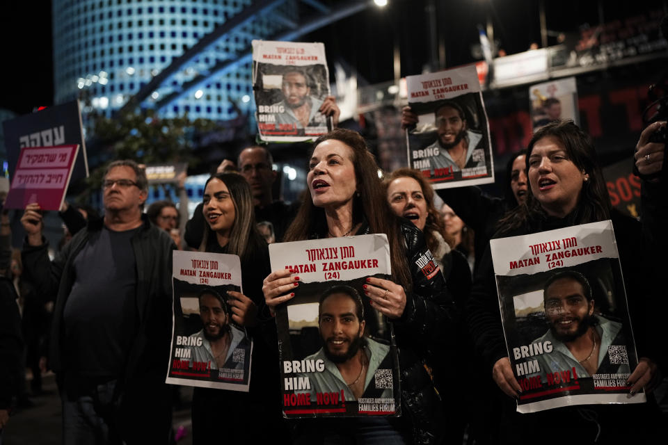 Relatives and supporters of the Israeli hostages held in the Gaza Strip by the Hamas militant group attend a rally calling for their release, in Tel Aviv, Israel, Saturday, March 16, 2024. (AP Photo/Ohad Zwigenberg)