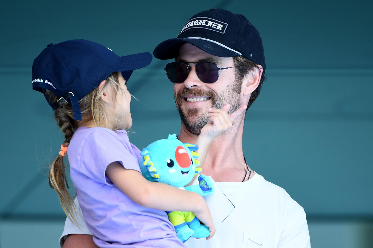 Chris Hemsworth and daughter India Rose Hemsworth attend the swimming on day three of the Gold Coast 2018 Commonwealth Games in Australia.