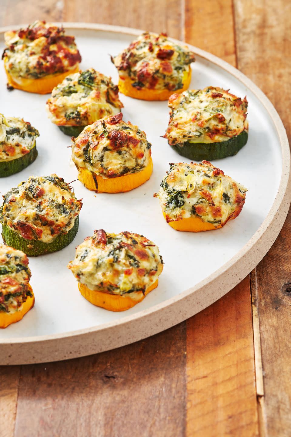 <p>Caution! They're addictive! </p><p>Get the recipe from <a href="https://www.delish.com/cooking/recipe-ideas/a22876942/spinach-artichoke-zucchini-bites-recipe/" rel="nofollow noopener" target="_blank" data-ylk="slk:Delish;elm:context_link;itc:0;sec:content-canvas" class="link ">Delish</a>. </p>