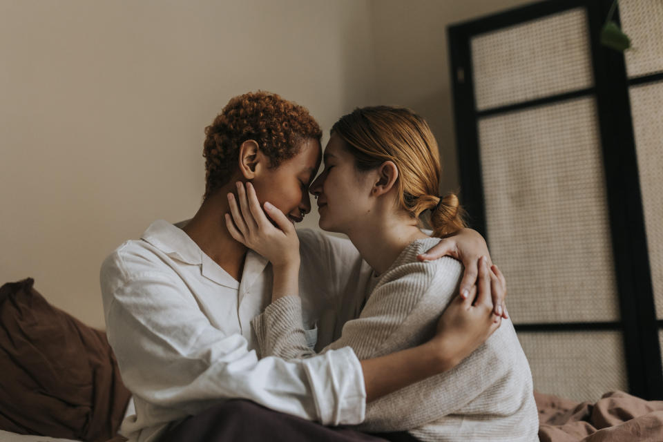 lesbian couple embracing