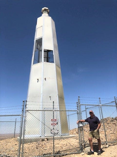 John standing by the Desert Lighthouse located near Hinkley, California as seen on 5/31/22. This structure shows the ingenuity and artistic talents of its creator, Daniel Hawkins.