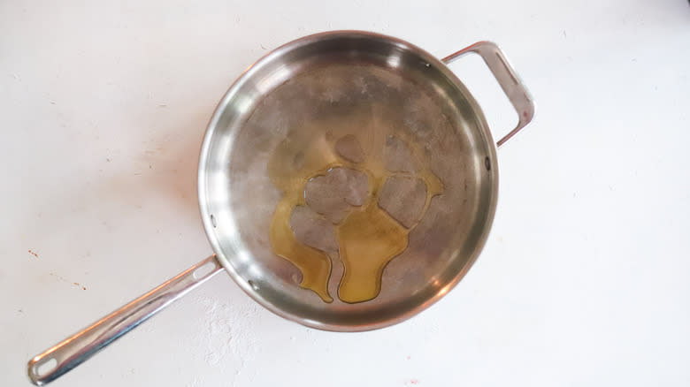 Heated oil in a pan