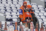 Denver Broncos fans look on before an NFL football game against the Kansas City Chiefs, Sunday, Oct. 25, 2020, in Denver. (AP Photo/Jack Dempsey)