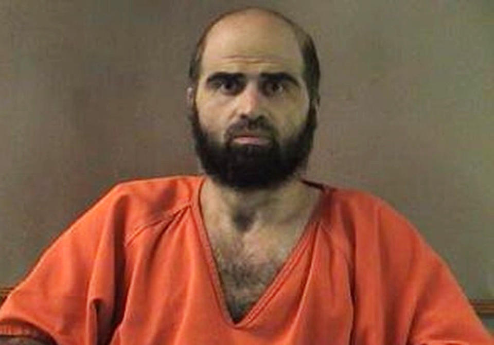 Hasan, 42, a U.S.-born Army psychiatrist of Palestinian descent, is accused in the 2009 shooting rampage that killed 13 people at the Army post in Fort Hood, Texas. The Hasan case prompted a slew of finger-pointing among government agencies over why more action wasn't taken when red flags appeared, particularly his e-mail contact with a radical cleric in Yemen.  <em>This undated file photo provided by the Bell County Sheriff's Department shows Nidal Hasan, who is charged in the 2009 shooting rampage at Fort Hood that left 13 dead and more than 30 others wounded. (AP Photo/Bell County Sheriff's Department, File)</em>