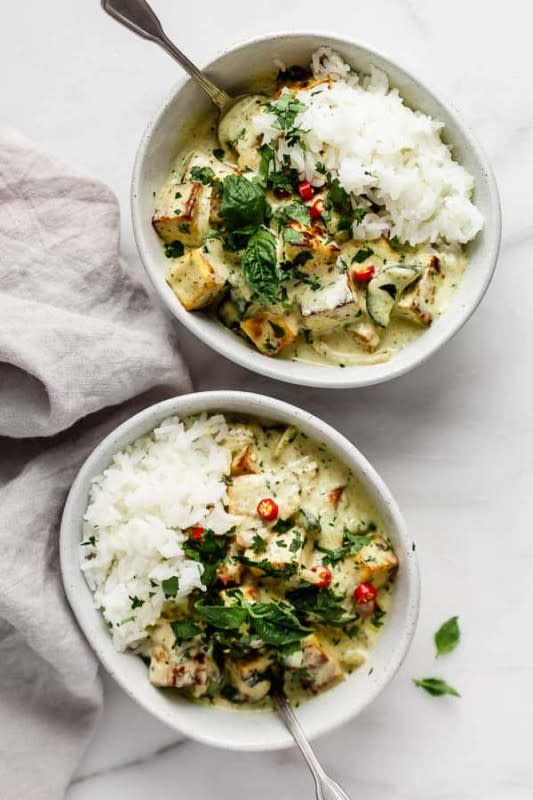 <p>Choosing Chia</p><p>This Thai green curry tofu features crispy tofu tossed up in a luscious creamy coconut sauce, with some spicy green curry! It’s a simple and healthy recipe that’s bursting with Thai flavor!</p><p><strong>Get the recipe: <a href="https://choosingchia.com/thai-green-curry-tofu/" rel="nofollow noopener" target="_blank" data-ylk="slk:Thai Green Curry Tofu;elm:context_link;itc:0;sec:content-canvas" class="link "><em>Thai Green Curry Tofu</em></a></strong></p>