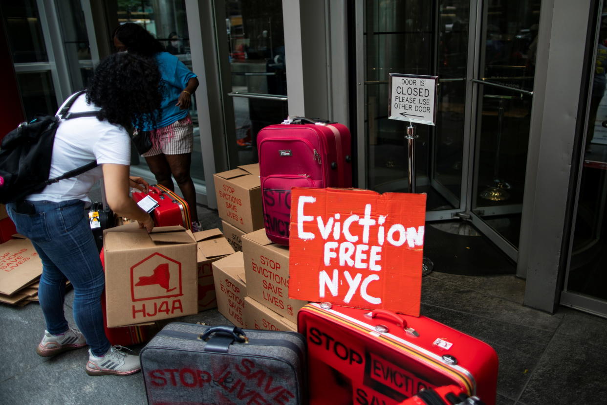 Protesters block the entrance of New York State governor Kathy Hochul's office building as they take part in a protest demanding rent relief or rent freeze in New York, U.S.,  August 31, 2021. REUTERS/Eduardo Munoz