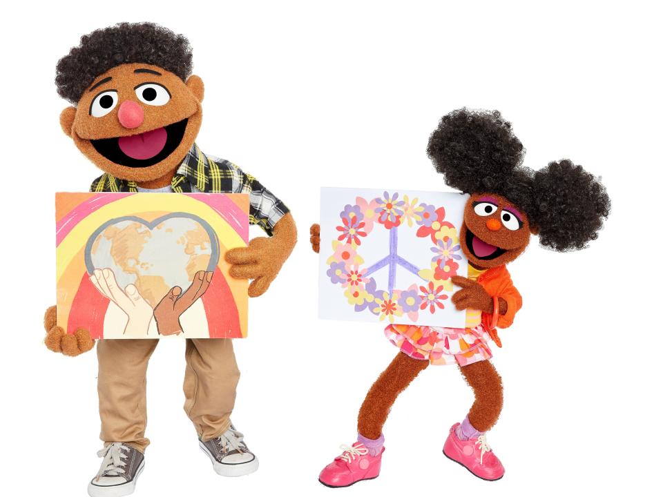 Puppet characters Tamir and Gabrielle from "Sesame Street"