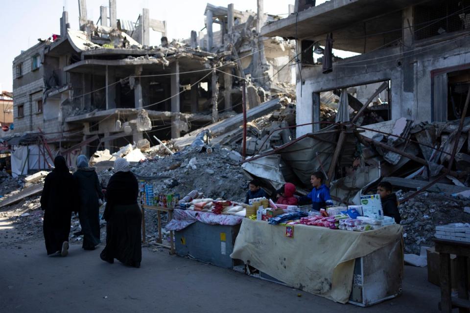As the war in Gaza continues to rage, with airstrikes causing destruction such as this in Rafah, Muslims in Britain say they have seen a rise in Islamophobia (AP)