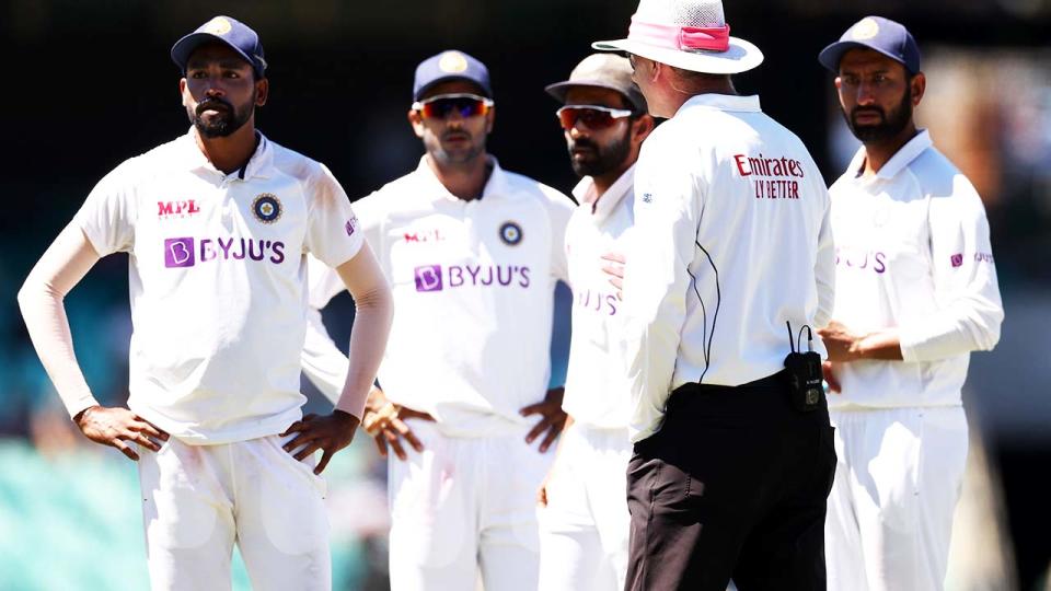 Mohammed Siraj and India teammates, pictured here looking at spectators following a complaint of abuse at the SCG.