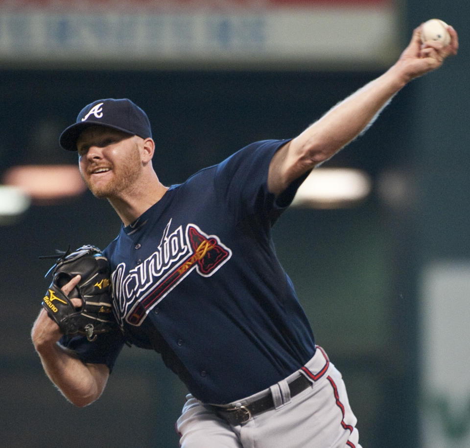 FILE - Atlanta Braves reliever Jonny Venters delivers a pitch during the ninth inning of a baseball game against the Houston Astros, Sunday, June 12, 2011, in Houston. Pitchers can look to Jonny Venters as they return from a second operation to repair a torn elbow ligament: He made it back to the big leagues after what he calls 3 1/2 Tommy John procedures. (AP Photo/Dave Einsel, File)