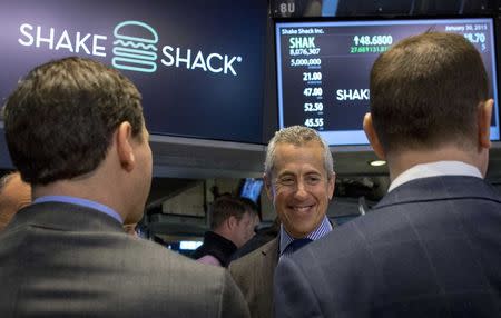 Shake Shack founder Danny Meyer celebrates his company's IPO on the floor of the New York Stock Exchange January 30, 2015. REUTERS/Brendan McDermid