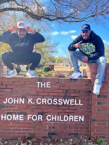 Davon and Tavon Woods pose outside the John K. Crosswell Home for Children in Sumter, S.C.