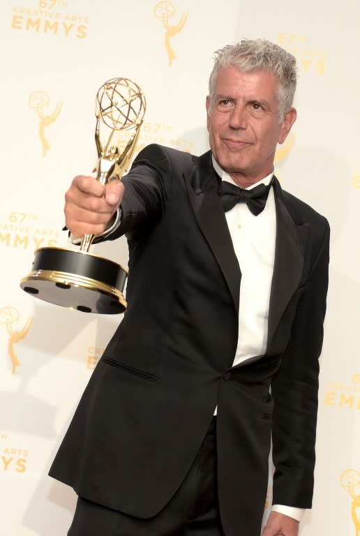 Chef and journalist Anthony Bourdain -- shown here with an Emmy in 2015 for his program "Parts Unknown" -- committed suicide in June 2018