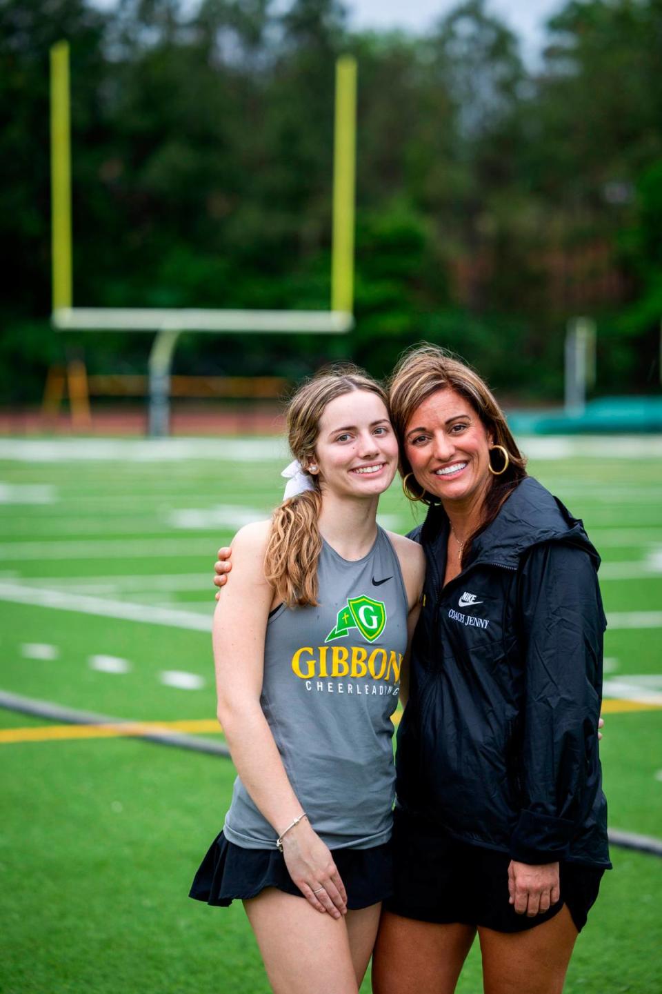 Coach Jennifer Marks and her daughter Ava Marks of the Cardinal Gibbons’ cheerleading squad.