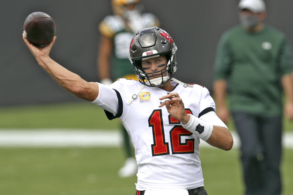 Tampa Bay Buccaneers quarterback Tom Brady (12) throws a pass before an NFL football game against the Green Bay Packers Sunday, Oct. 18, 2020, in Tampa, Fla. (AP Photo/Mark LoMoglio)