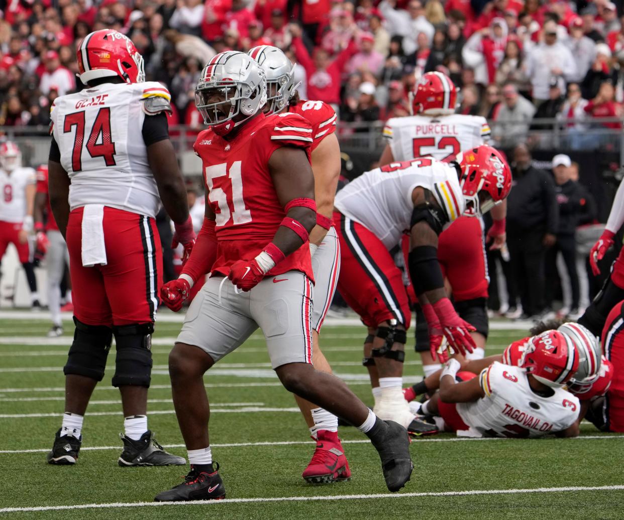 Oct. 7, 2023; Columbus, Oh., USA; 
Ohio State Buckeyes defensive tackle Michael Hall Jr. (51) reacts after sacking Maryland Terrapins quarterback Taulia Tagovailoa (3) during the second half of Saturday's NCAA Division I football game at Ohio Stadium.