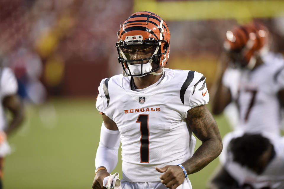 LANDOVER, MARYLAND - AUGUST 20: Ja'Marr Chase #1 of the Cincinnati Bengals runs onto the field before the NFL preseason game against the Washington Football Team at FedExField on August 20, 2021 in Landover, Maryland. (Photo by Greg Fiume/Getty Images)