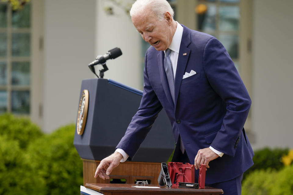 FILE - President Joe Biden holds pieces of a 9mm pistol as he speaks in the Rose Garden of the White House in Washington, April 11, 2022. Biden announced a final version of the administration's ghost gun rule, which comes with the White House and the Justice Department under growing pressure to crack down on gun deaths. (AP Photo/Carolyn Kaster, File)