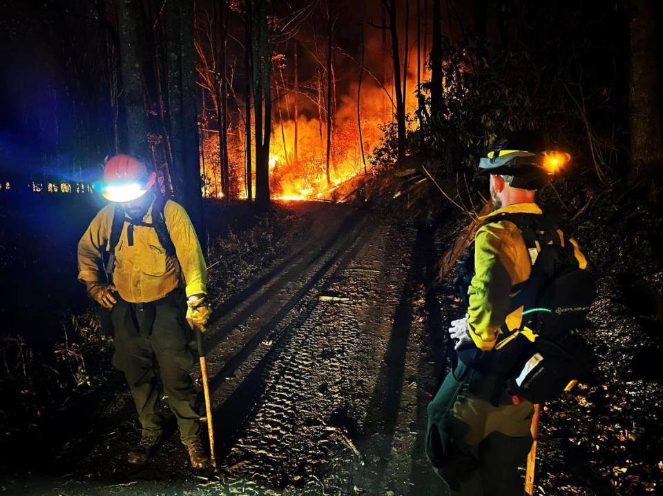 Two firefighters are among a crew of more than 150 who have been struggling to contain the Collett Ridge Fire in the far southwestern corner of North Carolina. Dry, warm weather has helped sustain the blaze. U.S. Forest Service