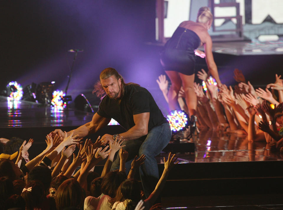 SAITAMA, JAPAN - MAY 30:  WWE Superstar Triple H (L) and Michellle McCool (R) attend the MTV Video Music Awards Japan 2009 at Saitama Super Arena on May 30, 2009 in Saitama, Japan.  (Photo by Junko Kimura/Getty Images)