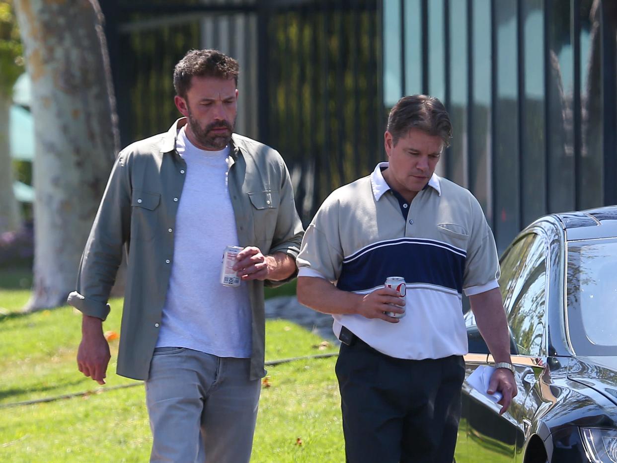 Ben Affleck and Matt Damon, with Damon in character as Sonny Vaccaro, on the set of "Air."