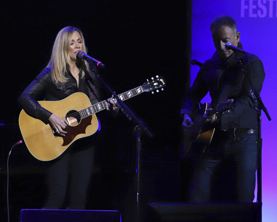 Sheryl Crow, left, and Bruce Springsteen perform at the 13th annual Stand Up For Heroes benefit concert in support of the Bob Woodruff Foundation at the Hulu Theater at Madison Square Garden on Monday, Nov. 4, 2019, in New York. (Photo by Greg Allen/Invision/AP)