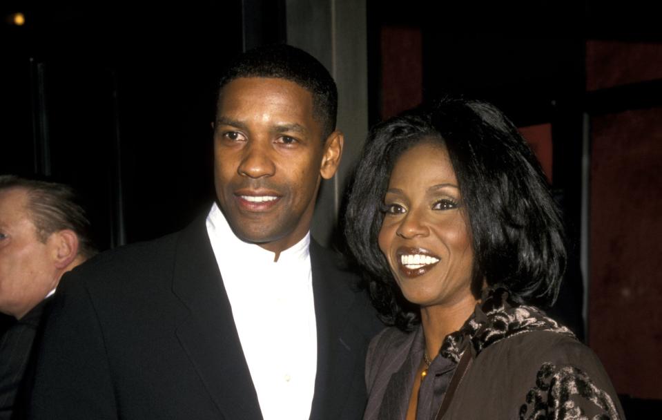 Denzel with his wife at a movie premiere