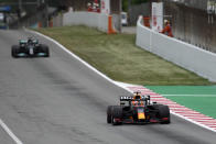 Red Bull driver Max Verstappen of the Netherlands leads followed by Mercedes driver Lewis Hamilton of Britain, left, during the Spanish Formula One Grand Prix at the Barcelona Catalunya racetrack in Montmelo, just outside Barcelona, Spain, Sunday, May 9, 2021. (AP Photo/Emilio Morenatti)