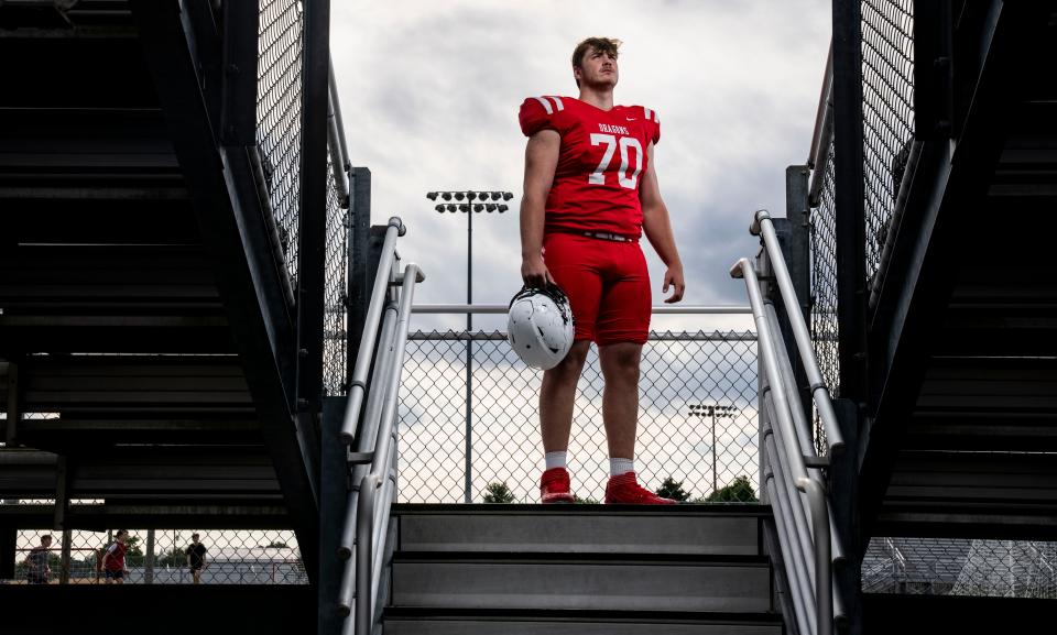 New Palestine Dragons Ian Moore poses for a photo Thursday, June 22, 2023, at New Palestine High School in New Palestine.