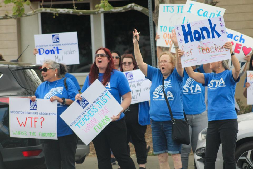 Members of the Stockton Teachers Association held a protest outside of the Stockton Unified School District headquarters on Tuesday, April 23, 2024.