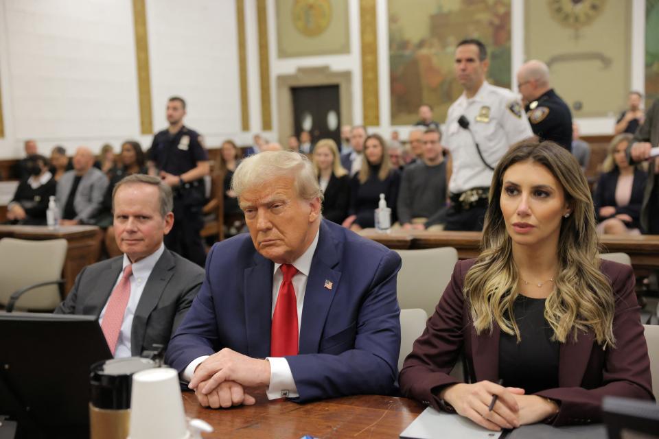 Former President Donald Trump sits in a Manhattan courtroom during the trial for his civil fraud case in New York, on 17 October, 2023 (REUTERS)