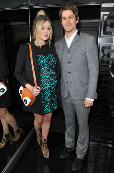 <b>Fearne Cotton and Jesse Wood</b><br><br>The Radio 1 DJ showed off her baby bump in a green dress and leopard print boots while her boyfriend Jesse Wood opted for a grey suit at Liam Gallagher's Pretty Green London Collections: Men's Autumn/Winter 2013 launch.<br><br>Image © WENN