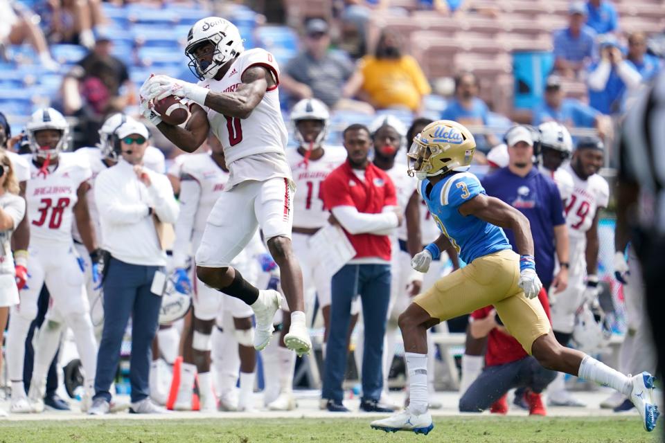 South Alabama wide receiver Jalen Wayne (0) catches a pass against UCLA defensive back Devin Kirkwood (3) during the second half of an NCAA college football game in Pasadena, Calif., Saturday, Sept. 17, 2022.