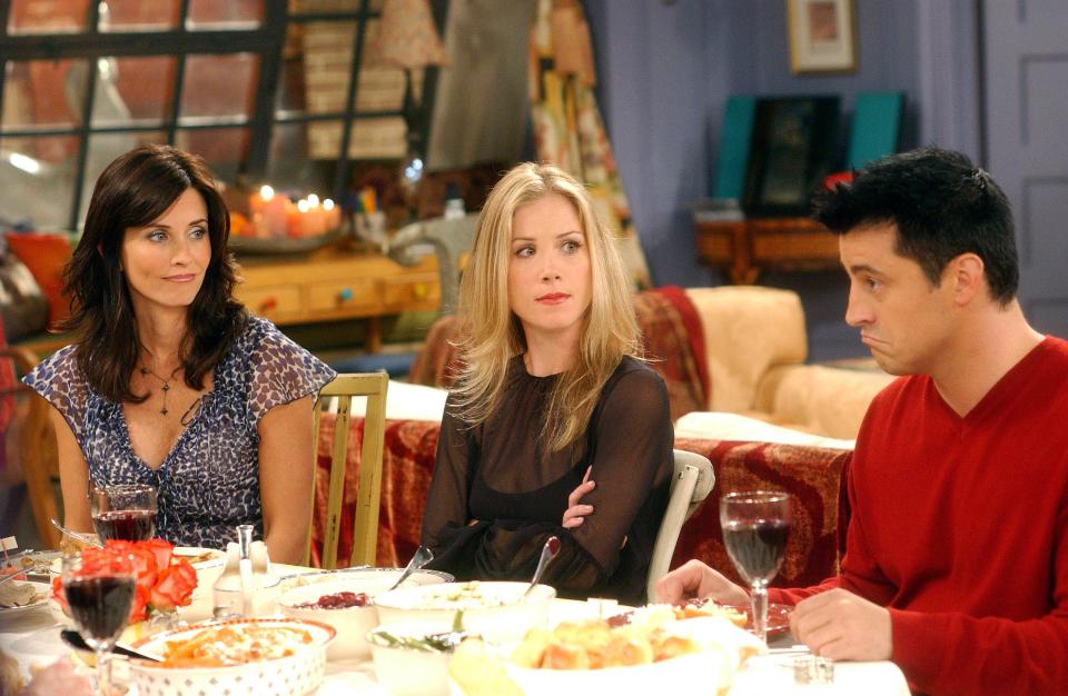 Courteney Cox as Monica, Christina Applegate as Rachel's sister Amy Green and Matt LeBlanc as Joey Tribbiani in the Season 9 Thanksgiving episode of "Friends."