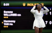 Serena Williams of the US reacts as she plays France's Harmony Tan in a first round women’s singles match on day two of the Wimbledon tennis championships in London, Tuesday, June 28, 2022. (John Walton/PA via AP)