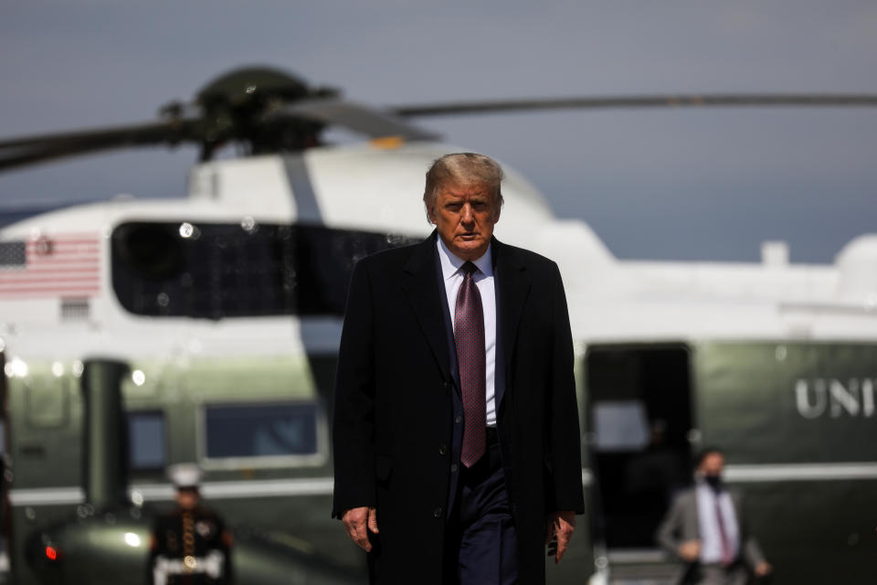 U.S. President Donald Trump walks from Marine One to board Air Force One as he departs Washington on campaign travel to New Jersey at Joint Base Andrews, Maryland, U.S., October 1, 2020. REUTERS/Leah Millis