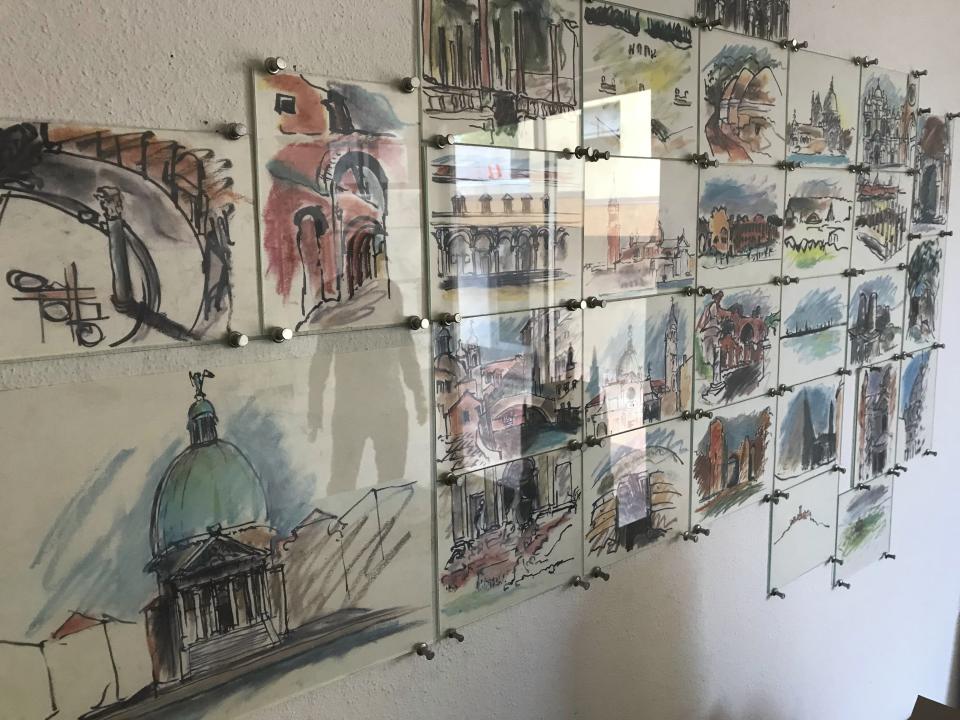 Renowned architect Antoine Predock's sketches line a wall in his studio in Albuquerque, N.M., April 30, 2018. Predock, whose list of credits includes award-winning buildings around the world, died Saturday, March 2, 2024, at his home in Albuquerque, according to longtime friends and colleagues. He was 87. (AP Photo/Susan Montoya Bryan)
