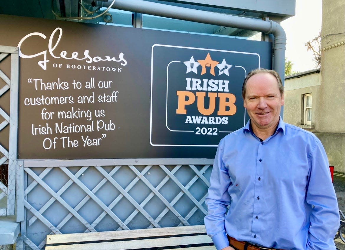 John Gleeson, who co-owns Gleeson's Pub with his brother Caoron, outside the establishment. Gleeson's was named Ireland’s National Pub of the Year.