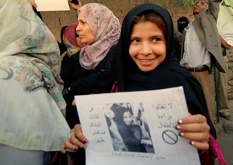 Yemeni former child bride Nujud Mohammed Ali protests in support of a child marriage ban outside the parliament in Sanaa on March 23, 2010. Yemen's rights minister said Saturday that she will press for the minimum age of marriage to be raised to 18, after the reported death of a young girl on her wedding night