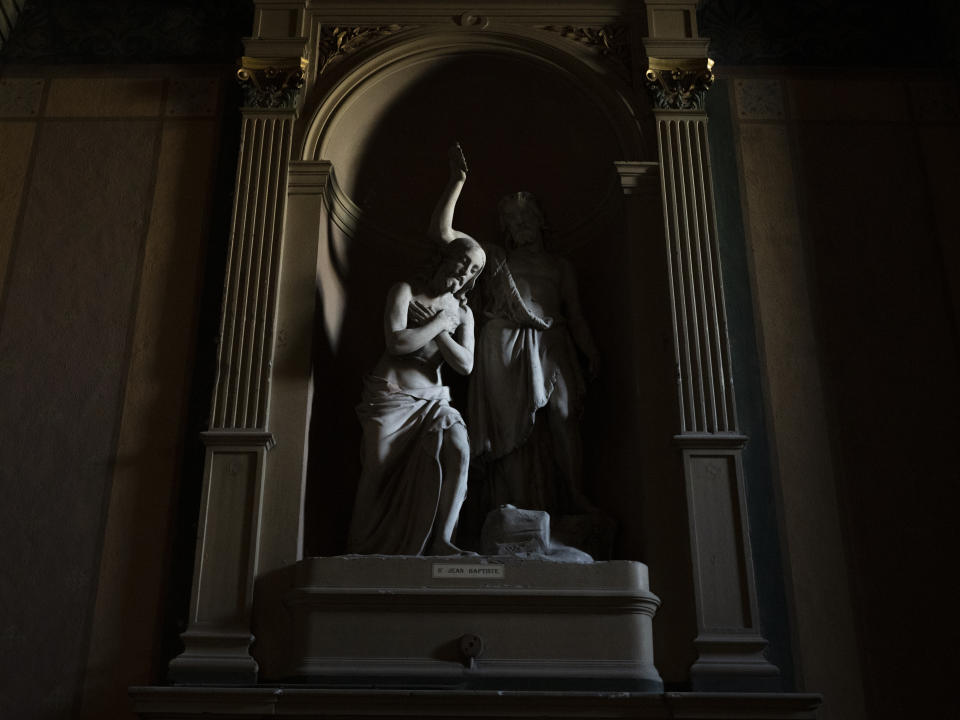 A statue of Saint Jean Baptiste is displayed at the Notre-Dame du Mont church in Marseille, southern France, Thursday, April 25, 2024. (AP Photo/Daniel Cole)