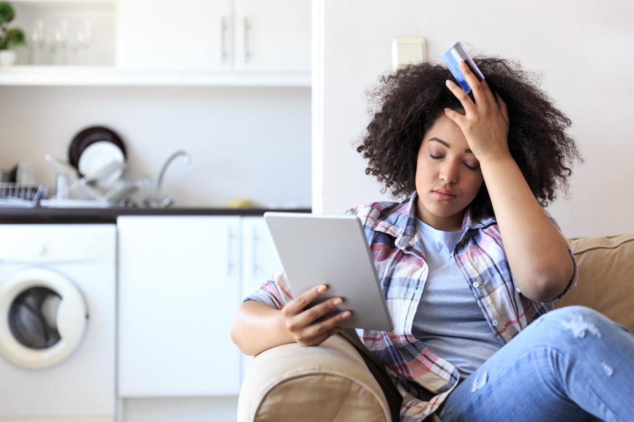Some colleges are extending the traditional May 1 deadline for students to accept offers. <a href="https://www.gettyimages.com/detail/photo/woman-with-digital-tablet-having-problems-royalty-free-image/832996896?phrase=paying+for+college+stressed+out&adppopup=true" rel="nofollow noopener" target="_blank" data-ylk="slk:valentinrussanov via Getty Images;elm:context_link;itc:0;sec:content-canvas" class="link ">valentinrussanov via Getty Images</a>