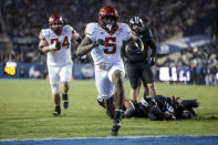 Iowa State running back Cartevious Norton (5) scores a touchdown against BYU during an NCAA college football game Saturday, Nov. 11, 2023, in Provo, Utah. (Spenser Heaps/The Deseret News via AP)