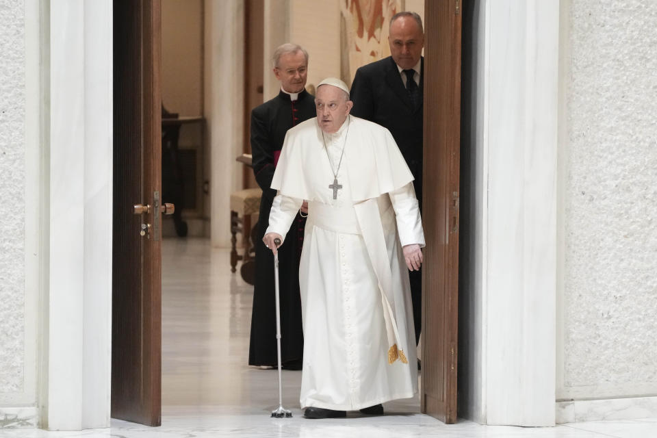 Pope Francis arrives in the Paul VI hall on the occasion of the weekly general audience at the Vatican, Wednesday, March 27, 2024. (AP Photo/Gregorio Borgia)