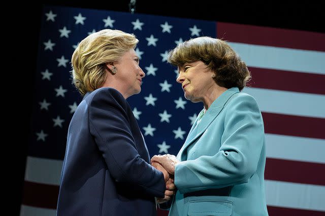 <p>BRENDAN SMIALOWSKI/AFP via Getty Images</p> Democratic presidential nominee Hillary Clinton and Sen. Dianne Feinstein embrace during a 2016 fundraiser in San Francisco