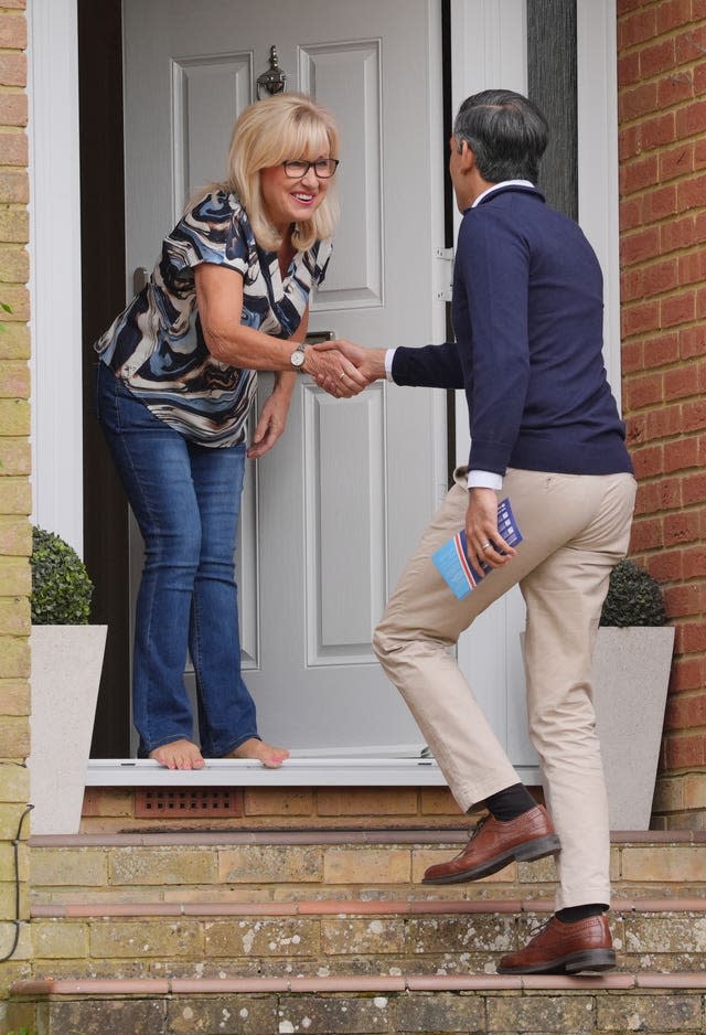 rime Minister Rishi Sunak knocking doors on the election campaign trail