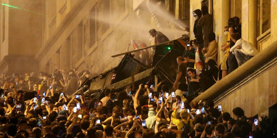 Demonstrators fighting riot police in Tbilisi, Georgia