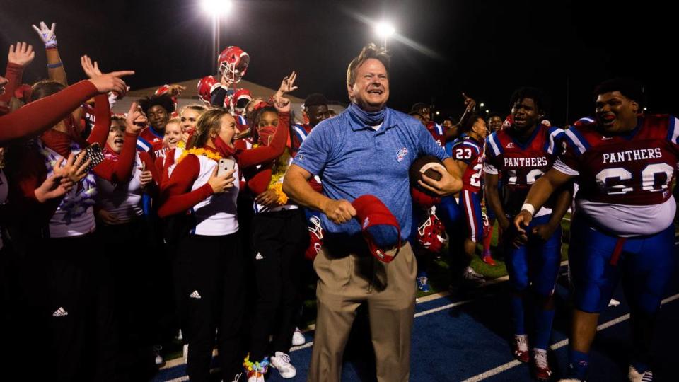 Pascagoula Head Coach Lewis Sims celebrates with the cheerleaders and his team in front of the home stands following the Panthers’ 35-32 overtime victory over Hattiesburg on Friday, Nov. 20, 2020. Lukas Flippo/lflippo@sunherald.com